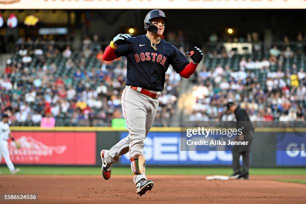 Alex Verdugo of the Boston Red Sox reacts after hitting a two-run home run during the fifth inning against the Seattle Mariners at T-Mobile Park on...