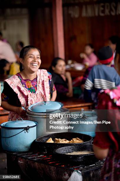 Street Vendor Selling Food At Market High-Res Stock Photo