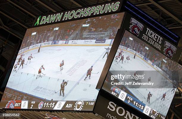 Dawn Hochsprung, a Sandy Hook Elementary School shooting victim is memorialized on the scoreboard during an American Hockey League game between the...