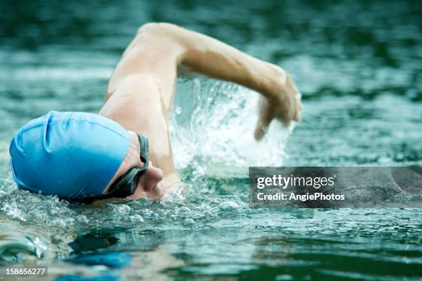 swimming - front crawl stock pictures, royalty-free photos & images