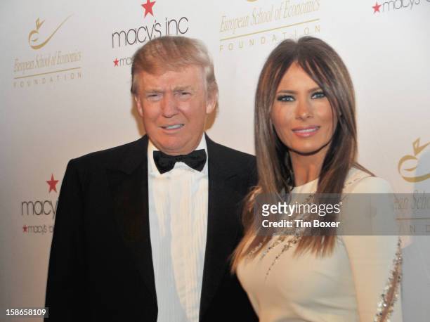 Portrait of American businessman and television personality Donald Trump and his wife, Slovenian former model Melania , as they attend a dinner for...