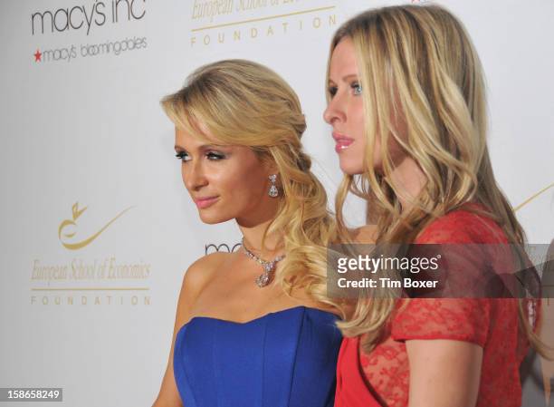 Portrait of American socialites and sisters Paris and Nicky Hilton as they attend a dinner for the European School of Economics Foundation at...