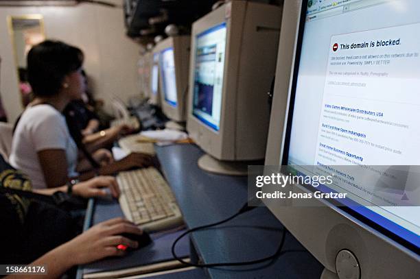 In an internet cafe, an internet site where cybersex is offered is blocked by the Philippines authorities. Two Swedes, a small time hustler in the...