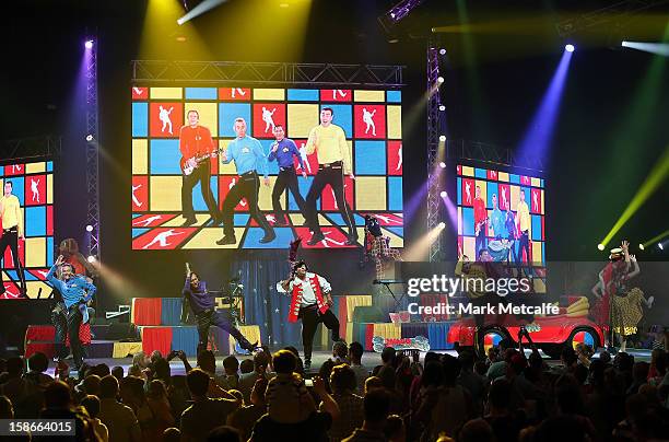 Jeff Fatt, Anthony Field, Greg Page and Murray Cook of The Wiggles perform on stage during The Wiggles Celebration Tour at Sydney Entertainment...