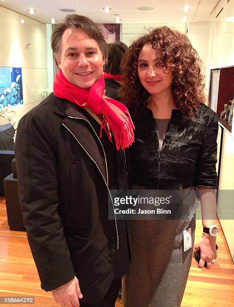 DuJour Media Founder Jason Binn and Angela Arabo pose at Art Basel circa December 2012 in Miami, Florida.