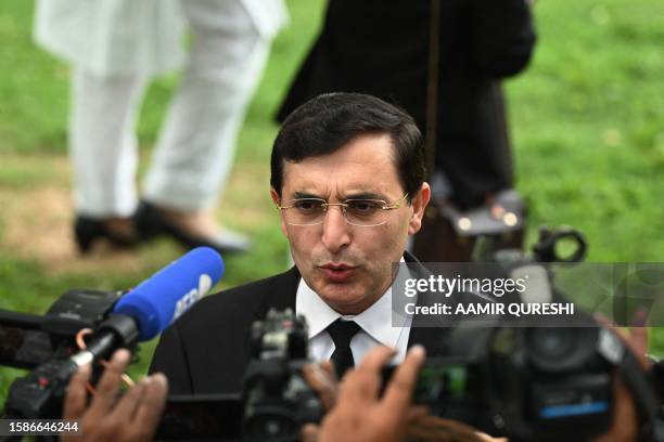 Gohar Khan, lawyer and legal team member of former Pakistan's Prime Minister Imran Khan, talks to the media as he arrives to attend a hearing at the...