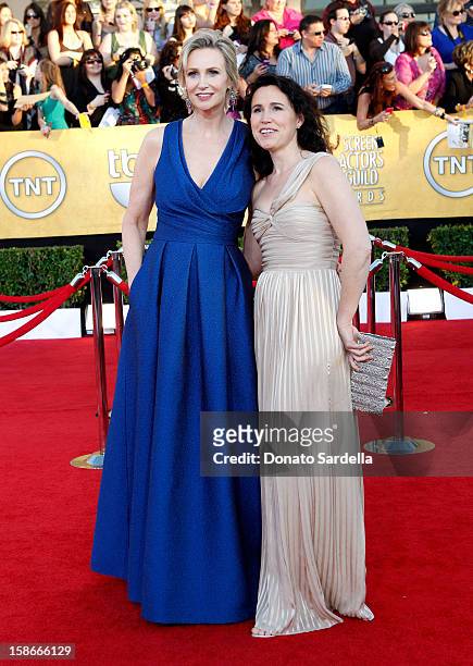 Actress Jane Lynch and Lara Embry arrive at the 18th Annual Screen Actors Guild Awards held at The Shrine Auditorium on January 29, 2012 in Los...