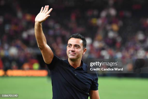 Manager Xavier "Xavi" Hernández Creus of FC Barcelona waves to fans after of a preseason friendly match against AC Milan during the 2023 Soccer...