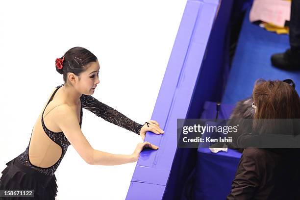 Kanako Murakami talks with her coach in the Women's Free Program during day three of the 81st Japan Figure Skating Championships at Makomanai Sekisui...