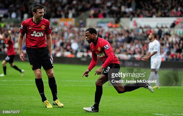 Patrice Evra of Manchester United celebrates his goal during the Barclays Premier League match between Swansea City and Manchester United at the...