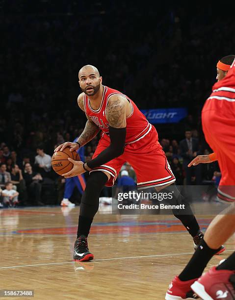 Carlos Boozer of the Chicago Bulls plays against the New York Knicks at Madison Square Garden on December 21, 2012 in New York City. NOTE TO USER:...