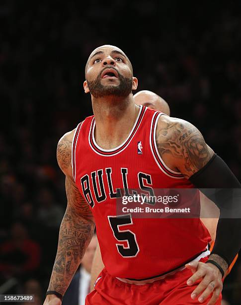 Carlos Boozer of the Chicago Bulls plays against the New York Knicks at Madison Square Garden on December 21, 2012 in New York City. NOTE TO USER:...