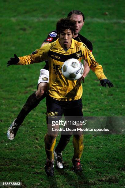 Yuki Otsu of Venlo controls the the ball infront of Martijn Monteyne of Roda JC during the Eredivisie match between VVV Venlo and Roda JC Kerkrade at...