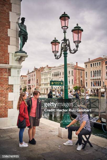 gondolier in venice - véneto stock pictures, royalty-free photos & images