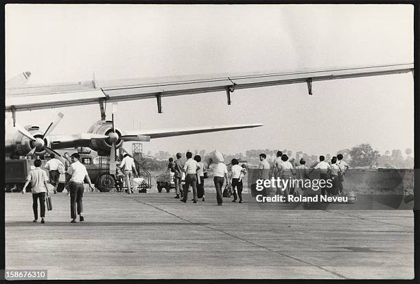 With Pochentong airport virtually under siege, every available plane is put into use by Cambodians desperate to escape their country for Saigon or...