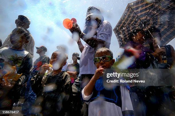 Youth during the New Year celebration festival in Yangoon in April..