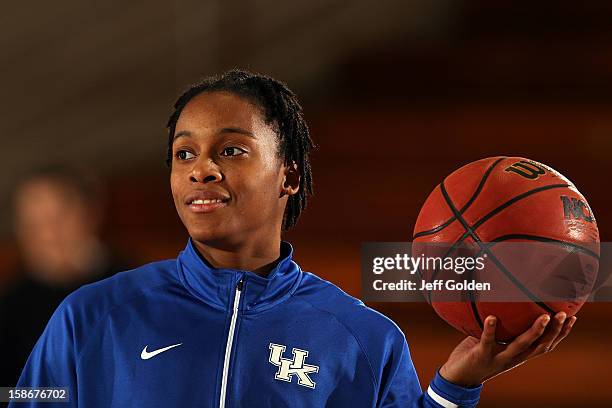 Dia Mathies of the Kentucky Wildcats smiles during warmups as she holds a basketball in her left hand before the game against the Pepperdine Waves at...