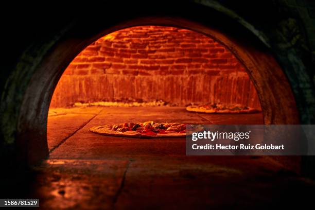 pizza in a wood oven - pizzaugn bildbanksfoton och bilder