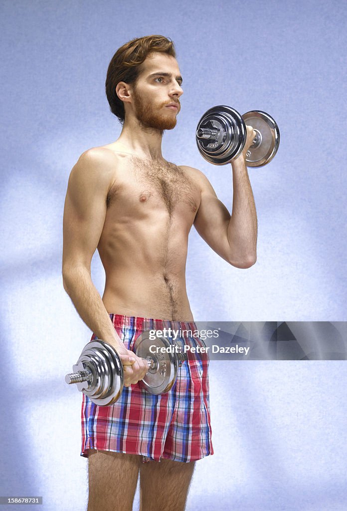 Young man with eating disorder working out