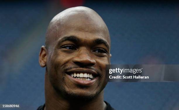 Adrian Peterson of the Minnesota Vikings walks off the field after the Vikings defeated the Houston Texans 23-6 at Reliant Stadium on December 23,...