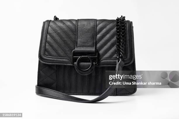 black leather women's handbag on white background - shoulder strap bag strap stockfoto's en -beelden