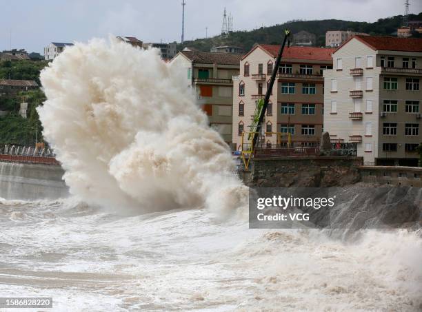 High waves brought by typhoon Khanun slap the shore on August 2, 2023 in Taizhou, Zhejiang Province of China.