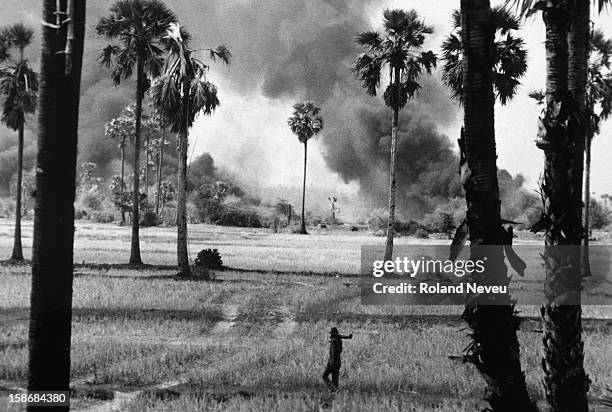Lon Nol troops supported by American fighter-bombers advance near the town of Samrong, 20 kms from the Capital's airport. The planes had been...