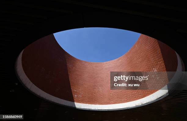 round red brick building - skylight stock pictures, royalty-free photos & images