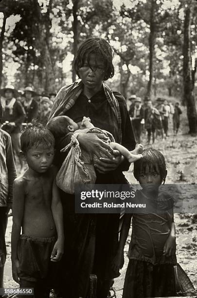 Thousand of Cambodia fled their country and starvation after the Vietnamese invaded Cambodia. This family is on its way to thr border with Thailand...