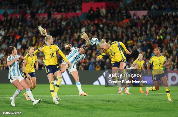 Camila Gomez Ares of Argentina and Caroline Seger of Sweden compete for the ball during the FIFA Women's World Cup Australia & New Zealand 2023 Group...