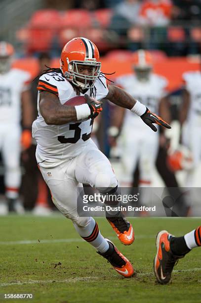Running back Trent Richardson of the Cleveland Browns rushes against the Denver Broncos during a game at Sports Authority Field Field at Mile High on...