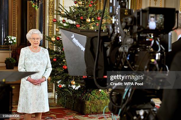 Queen Elizabeth II records her Christmas message to the Commonwealth in 3D for the first time from the White Drawing Room of Buckingham Palace on...