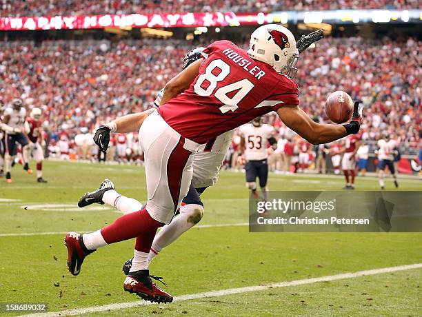 Tight end Rob Housler of the Arizona Cardinals attempts to make a diving reception during the NFL game against the Chicago Bears at the University of...