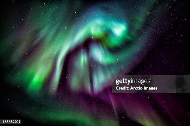 aurora borealis or northern lights, iceland - northern lights iceland stockfoto's en -beelden