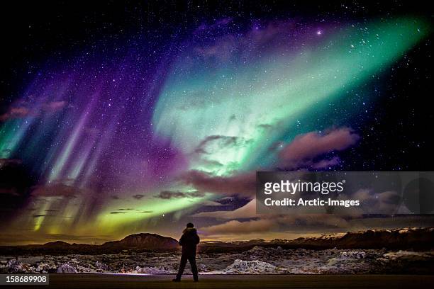 aurora borealis or northern lights, iceland - iceland aurora stock pictures, royalty-free photos & images
