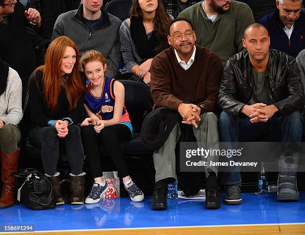 Julianne Moore, Liv Helen Freundlich, Sanderson Jeter and Derek Jeter attend the Minnesota Timberwolves vs New York Knicks game at Madison Square...