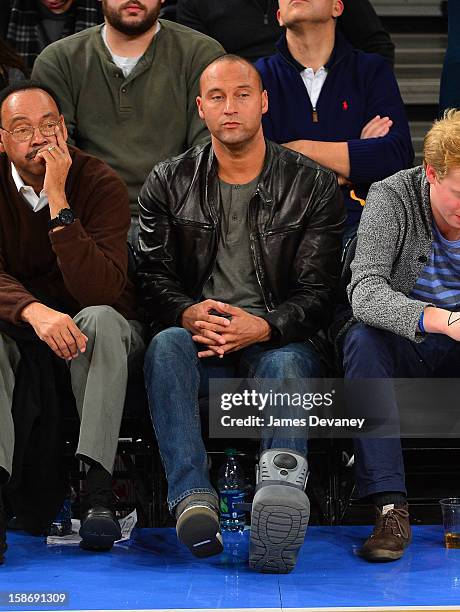 Derek Jeter and father, Sanderson Jeter attend the Minnesota Timberwolves vs New York Knicks game at Madison Square Garden on December 23, 2012 in...