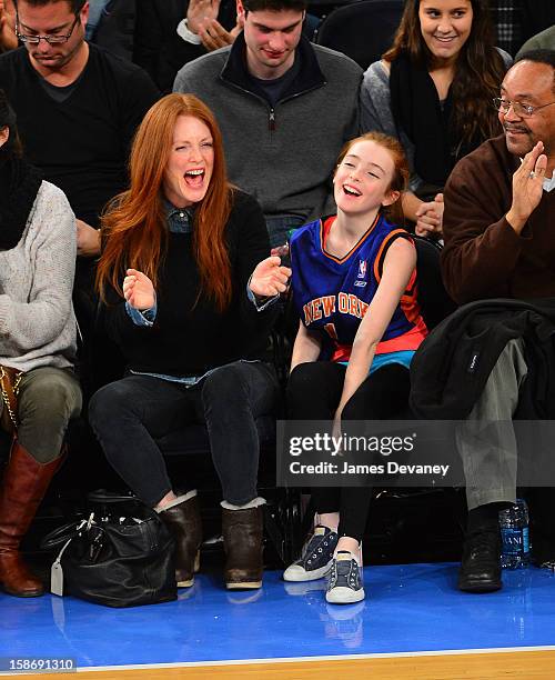 Julianne Moore and Liv Helen Freundlich attend the Minnesota Timberwolves vs New York Knicks game at Madison Square Garden on December 23, 2012 in...