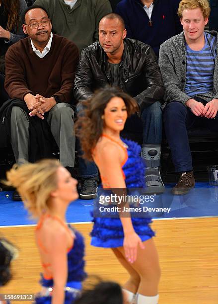Derek Jeter and father, Sanderson Jeter attend the Minnesota Timberwolves vs New York Knicks game at Madison Square Garden on December 23, 2012 in...