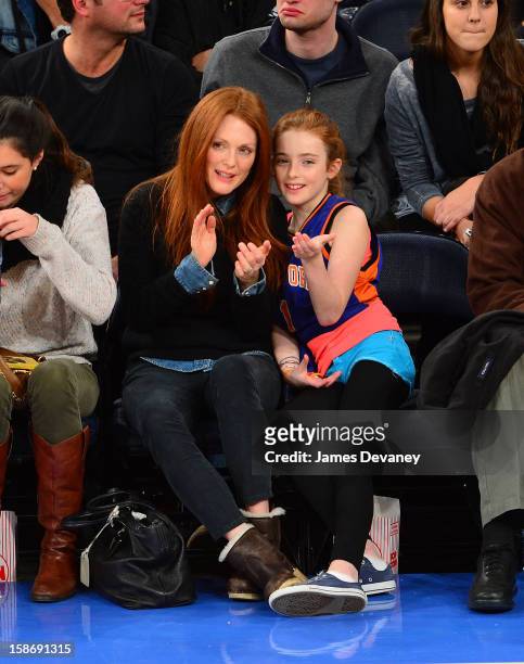 Julianne Moore and Liv Helen Freundlich attend the Minnesota Timberwolves vs New York Knicks game at Madison Square Garden on December 23, 2012 in...