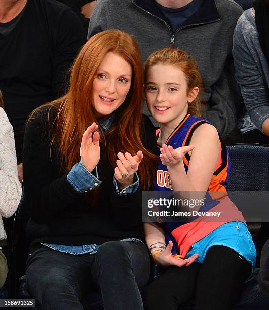 Julianne Moore and Liv Helen Freundlich attend the Minnesota Timberwolves vs New York Knicks game at Madison Square Garden on December 23, 2012 in...