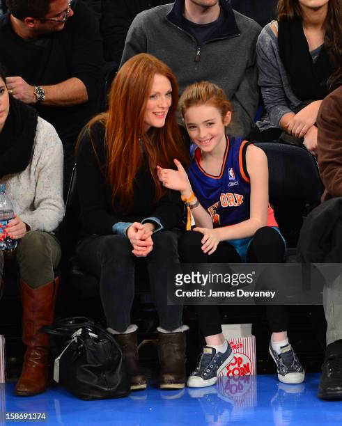 Julianne Moore and Liv Helen Freundlich attend the Minnesota Timberwolves vs New York Knicks game at Madison Square Garden on December 23, 2012 in...