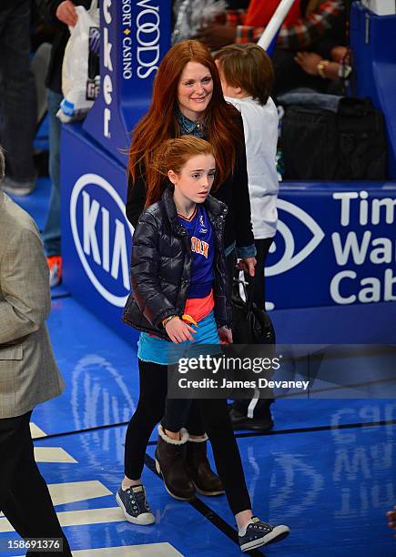 Julianne Moore and Liv Helen Freundlich attend the Minnesota Timberwolves vs New York Knicks game at Madison Square Garden on December 23, 2012 in...