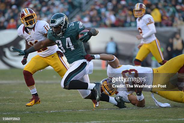 December 23: Washington Redskins linebacker Bryan Kehl trips up Philadelphia Eagles kick returner Bryce Brown during 3rd quarter action on December...
