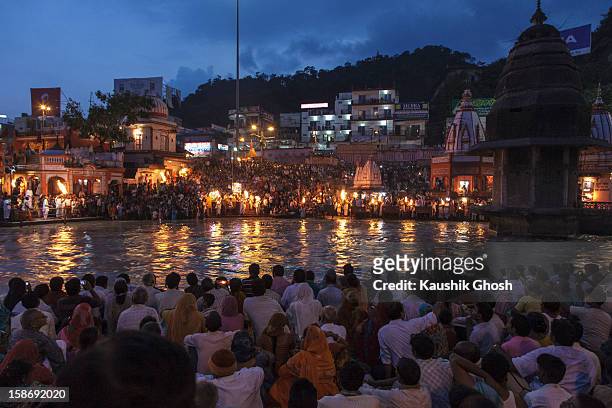 Devotees gathered during the daily evening prayer at Har-ki-pauri, Haridwar