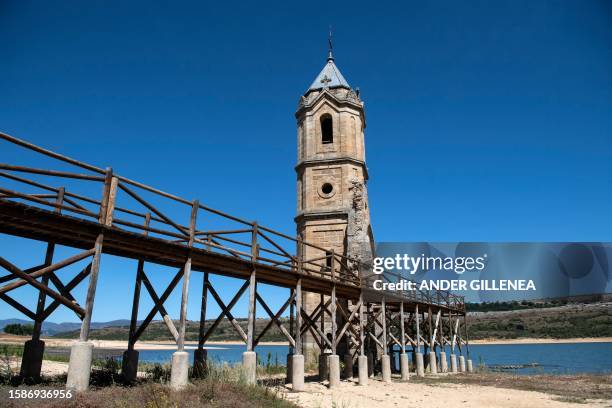 The ruins of San Roque church in Villanueva, normally submerged partially in the waters of the Ebro reservoir, in the northern province of Cantabria,...