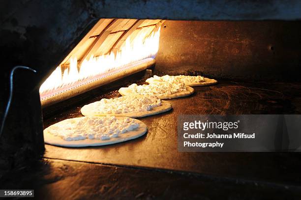 the tradition of manakish bread, lebanon - lebanese food stock-fotos und bilder