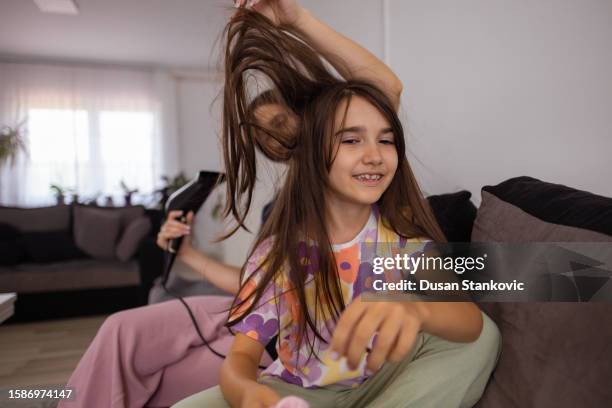 mommy, i need help drying my hair - drying hair stock pictures, royalty-free photos & images