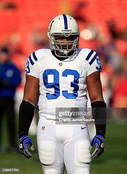 Outside linebacker Dwight Freeney of the Indianapolis Colts warms up prior turnover the game against the Kansas City Chiefs at Arrowhead Stadium on...