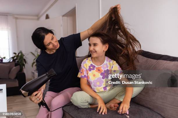 my mommy helps me dry my hair - drying hair stock pictures, royalty-free photos & images